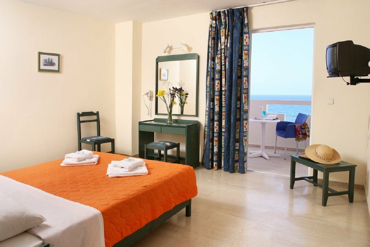 Evelyn Beach Hotel Херсониссос Экстерьер фото