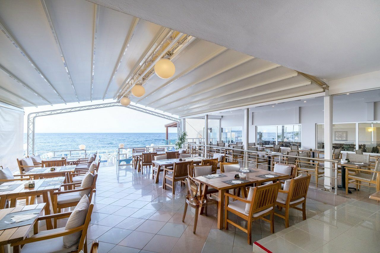 Evelyn Beach Hotel Херсониссос Экстерьер фото